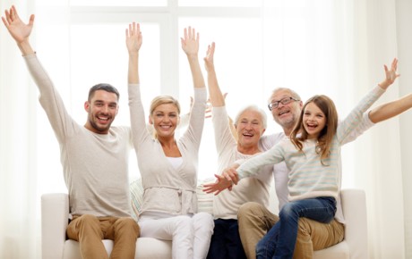 Family on steamed cleaned sofa